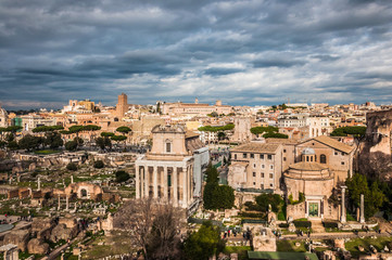 Fototapeta na wymiar Roman forum view with cloudy sky on the background