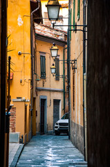 Fototapeta na wymiar Narrow street in Italy