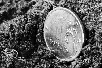 One ruble on the ground. Coin.