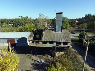 Drone quadrocopter with high resolution digital camera explores an abandoned  huge milk farm near...