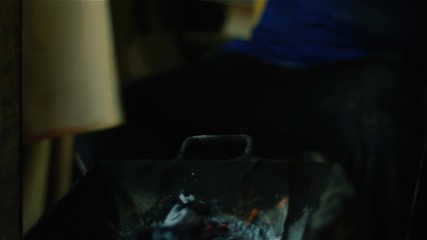 Artisan Heating the Wood in the Fire. Craft Workshop of Harps in Asuncion, Paraguay. Close-Up. Full HD. 