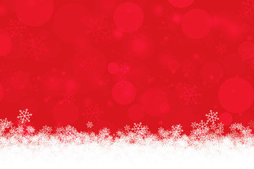 Abstract red Xmas background with snowflakes and bokeh light for winter season and Christmas day concept