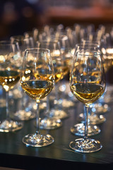 Lots of full champagne and wine glasses