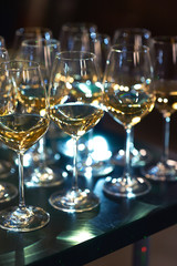 Lots of full champagne and wine glasses