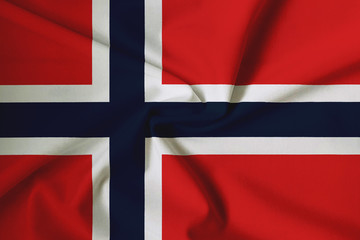 Fototapeta premium National flag of Norway on a waving cotton texture background