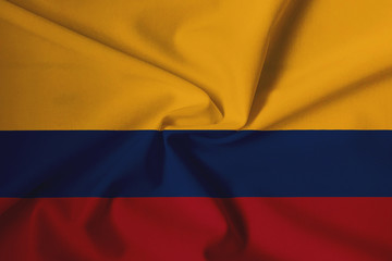 Fototapeta premium Waving Colombian flag with a fabric texture