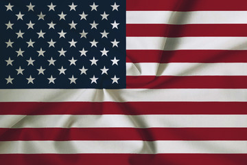 Waving United States of America flag with a fabric texture