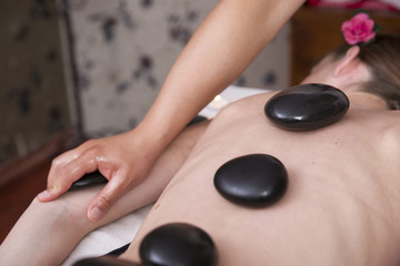 Obraz na płótnie Canvas Hot Massage Therapy
