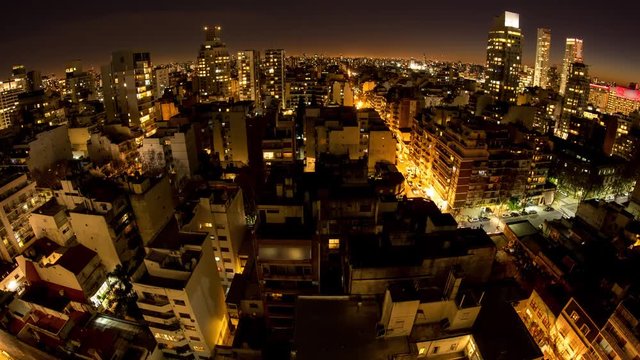 Night time-lapse view on the skyline of the city from a balcony of a high rise apartment in Buenos Aires, Argentina.

