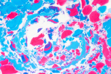 Abstract colored background. Stains of paint on the water. Ebru art, marbled paper.