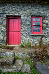 Vintage door and window on a facade of an old cottage in Ireland