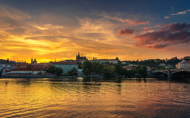Fototapeta na wymiar Prague Castle and Vltava river at sunset