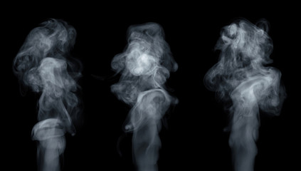 Fog or smoke set isolated on black background. White cloudiness, mist or smog background.