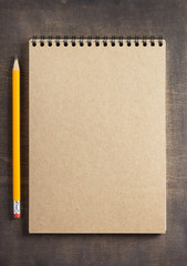 notepad at wooden background surface table