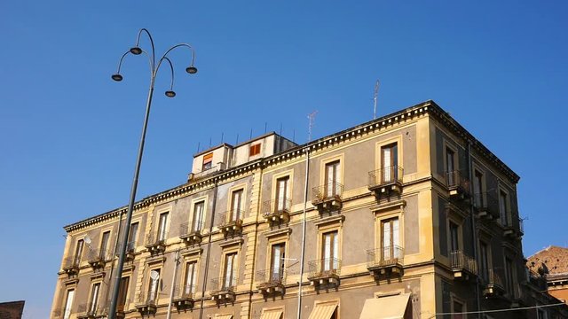 View on historic architecture of the downtown on a sunny day in Catania, Italy.
