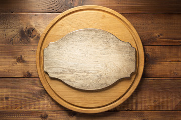 retro signboard at wooden cutting board