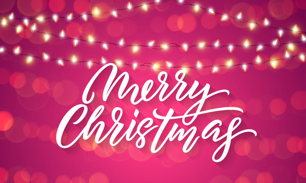 Christmas lights and sparkling light flares on Xmas holiday background. Vector Merry Christmas lettering with holiday glittery sparkles