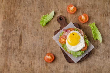 Traditional sandwich with fried bacon