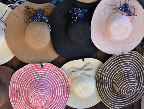 Floppy hats on a wall
