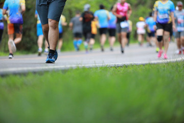 Obraz premium Group of people running race marathon