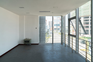 Empty rooms and buildings outside the window