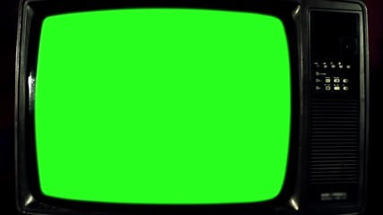 Old Television with Green Screen. Blue Steel Tone. Ready to Replace Green Screen with Any Footage or Picture you Want. You Can Do it With “Keying” (Chroma Key) Effect. Zoom In. Close-Up. Full HD. 