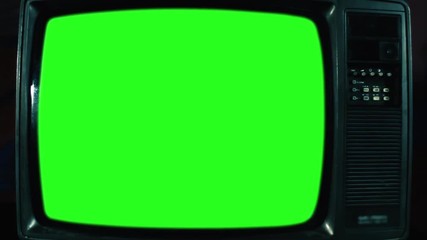Old Television with Green Screen. Dark Blue Tone. Ready to Replace Green Screen with Any Footage or Picture you Want. You Can Do it With “Keying” (Chroma Key) Effect. Zoom In. Close-Up. Full HD. 