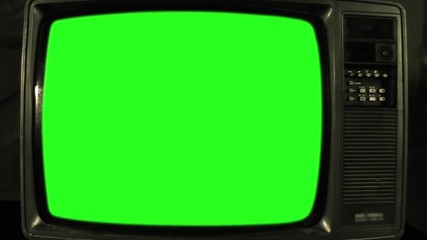 Old Television with Green Screen. Ready to Replace Green Screen with Any Footage or Picture you Want. You Can Do it With “Keying” (Chroma Key) Effect. Zoom In. Close-Up. Full HD. 