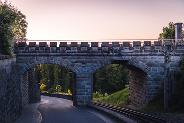 Naklejka premium railway bridge during sunset