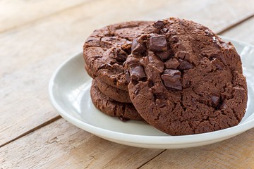 Soft baked Chocolate cookies in white plate, Close up images