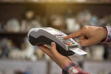 a finger press on credit card