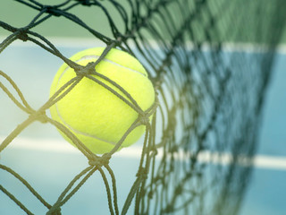 Tennis ball hit the net