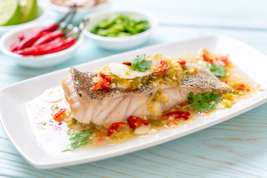 Steamed Grouper Fish Fillet with Chili Lime Sauce in lime dressing