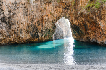 Natural Arch of Arcomagno San Nicola Arcella, Tyrrhenian Sea, South of Italy.