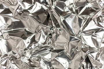 Full frame take of a sheeT of crumpled silver aluminum foil