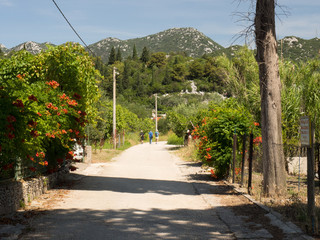 Naklejka premium Tourist enjoing the walk around the beautiful Bacina lakes in Dalmatia,Croatia - holiday destination