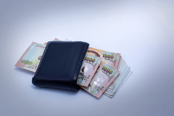 1000 baht banknotes, Thai money with black wallet 