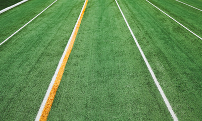 Empty green running track background
