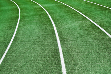 Empty running track with an artificial turf