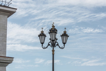 street lamp next to the building wall