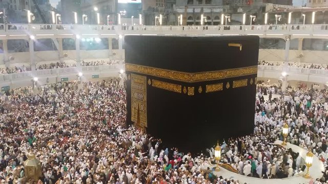 4K footage Muslim pilgrims circumambulate the Kaaba at Masjidil Haram in Makkah, Saudi Arabia. Muslims all around the world face the Kaaba during prayer time.