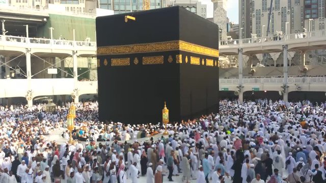 4K footage Muslim pilgrims circumambulate the Kaaba at Masjidil Haram in Makkah, Saudi Arabia. Muslims all around the world face the Kaaba during prayer time.