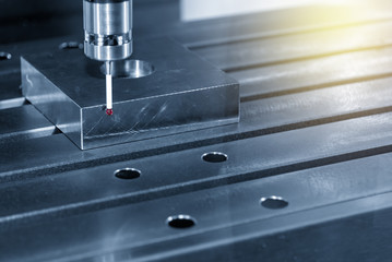 The  CMM laser probe  attach on the CNC machine  setup the  material part for CNC milling machine.