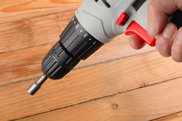Screwdriver in a man's hand close up
