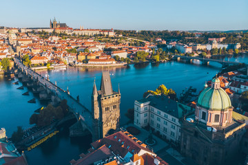 aerial view on sunrise of charles bridge in prague