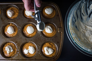 Baking pumpkin cream cheese muffins