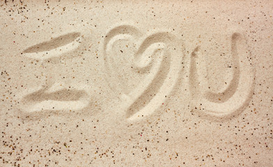 I love you message in the sand
