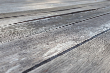 Wooden floor is made of old wooden boards with beautiful patterns