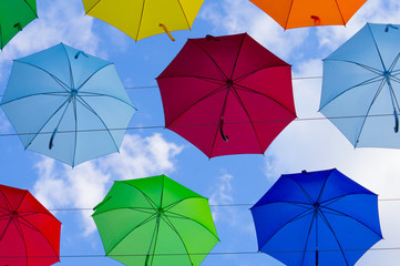 colorful umbrellas soaring in the sky