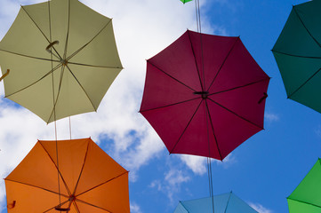 hanging colorful umbrellas on a sunny day